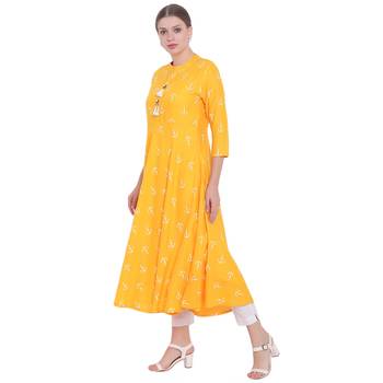 Yellow printed rayon kurtas-and-kurtis 4