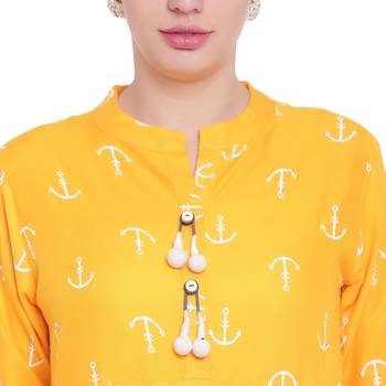 Yellow printed rayon kurtas-and-kurtis 5