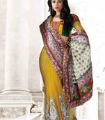 Yellow embroidered net saree with blouse
