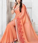 Peach woven georgette saree with blouse