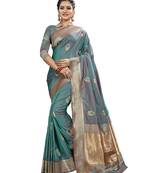 Green woven banarasi and jacquard saree with blouse