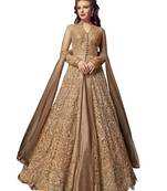 Beige embroidered net salwar with dupatta