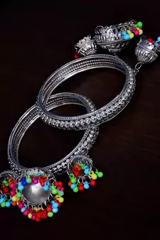 Silver Plated Pair of Designer Bangles with Multiple Hanging Jhumkis