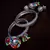 Silver Plated Pair of Designer Bangles with Multiple Hanging Jhumkis