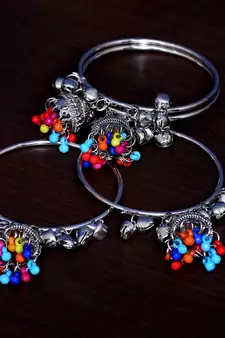 Silver Plated Two Pairs of Designer Bangles with Multiple Hanging Jhumkis and Bells