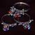 Silver Plated Two Pairs of Designer Bangles with Multiple Hanging Jhumkis and Bells