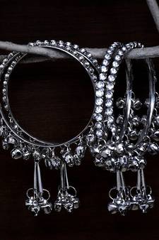 Silver Plated Kundan Embellished Two Pairs of Designer Bangles with Hanging Bells