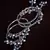 Silver Plated Kundan Embellished Two Pairs of Designer Bangles with Hanging Bells