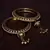 Gold Plated Zircon Stone and Seed Pearls Embellished Pair of Bangles with Hanging Bells