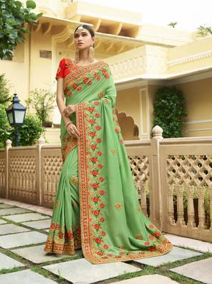 Green embroidered silk blend saree with blouse 1