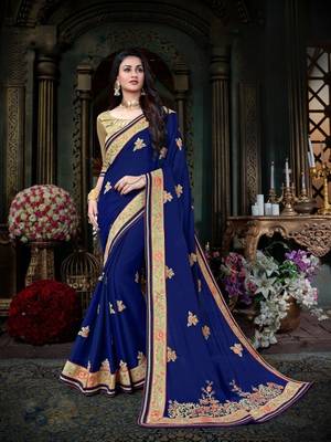 Blue embroidered georgette saree with blouse 1