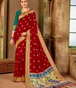 Red woven silk blend saree with blouse