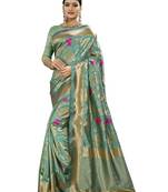 Green woven banarasi saree with blouse