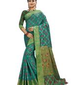 Green woven patola saree with blouse