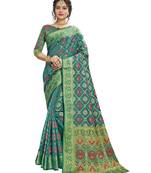 Green woven patola saree with blouse