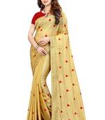 Cream embroidered georgette saree with blouse