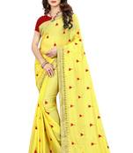 Yellow embroidered georgette saree with blouse