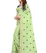 Green embroidered georgette saree with blouse