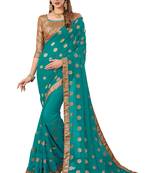 Blue embroidered georgette saree with blouse