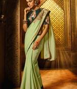 Green plain faux fabric saree with blouse
