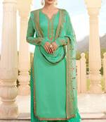 Turquoise embroidered georgette salwar with dupatta