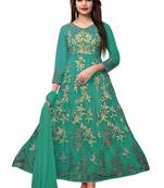 Turquoise embroidered net semi stitched salwar with dupatta