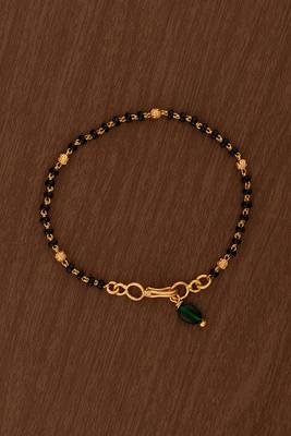 Black beads bracelet with emerald bead hangings one gram gold 1