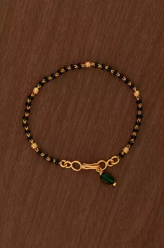 Black beads bracelet with emerald bead hangings one gram gold