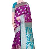 Magenta woven poly silk saree with blouse