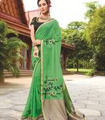 Green printed georgette saree with blouse