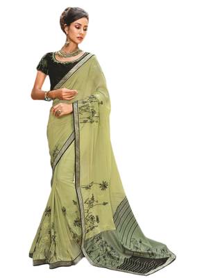Green printed georgette saree with blouse 1