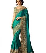 Green embroidered georgette saree with blouse