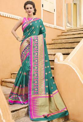 Green woven silk blend saree with blouse 1