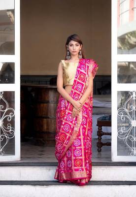 Magenta silk checked bandani print saree with heavy zari 1