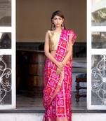 Magenta silk checked bandani print saree with heavy zari