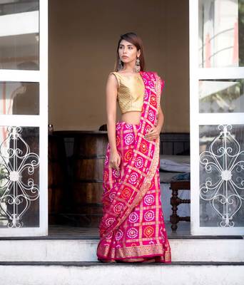 Magenta silk checked bandani print saree with heavy zari 2