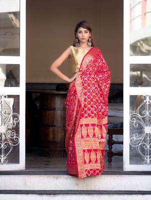 Red art silk saree with zari weaves and heavy pallu 1