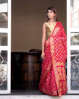 Red art silk saree with zari weaves and heavy pallu 3