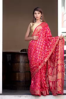 Red art silk saree with zari weaves and heavy pallu