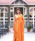 Kesariya rang art silk saree with golden blouse