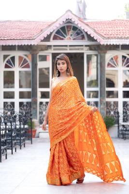 Kesariya rang art silk saree with golden blouse 3