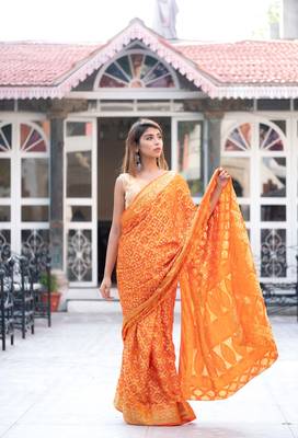 Kesariya rang art silk saree with golden blouse 4