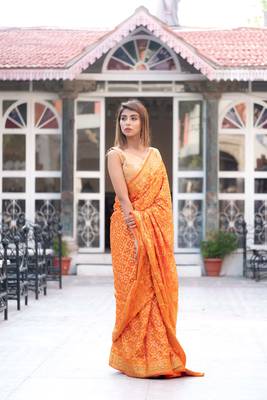 Kesariya rang art silk saree with golden blouse 5