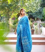 Blue art silk saree with silver blouse
