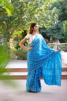 Blue art silk saree with silver blouse