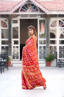 Red art silk checked saree with zari waeves and heavy pallu