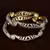 Gold Plated Brass Made CZ Stone Embellished Ball Styled Designer Bangles 