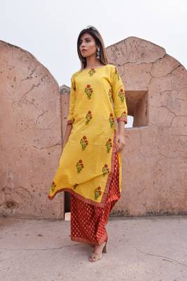 Yellow printed cotton kurta sets 1