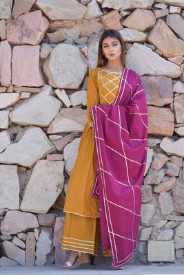 Mustard plain cotton kurta sets 1