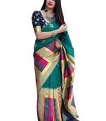 Sea green woven banarasi silk blend saree with blouse